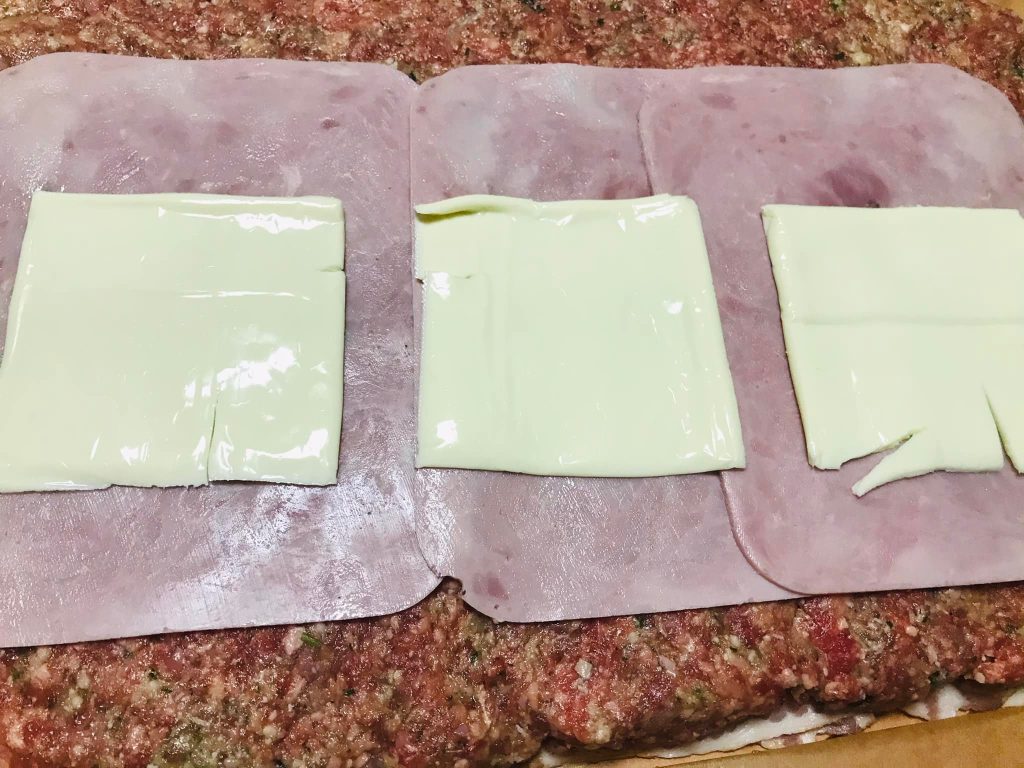 Ricetta Polpettone ripieno con patate, piselli e carote - passaggio 18