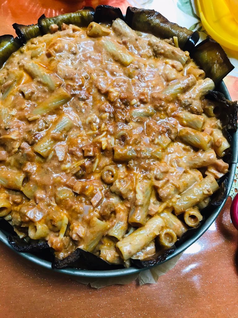 Ricetta Timballo di rigatoni al forno - passaggio 16